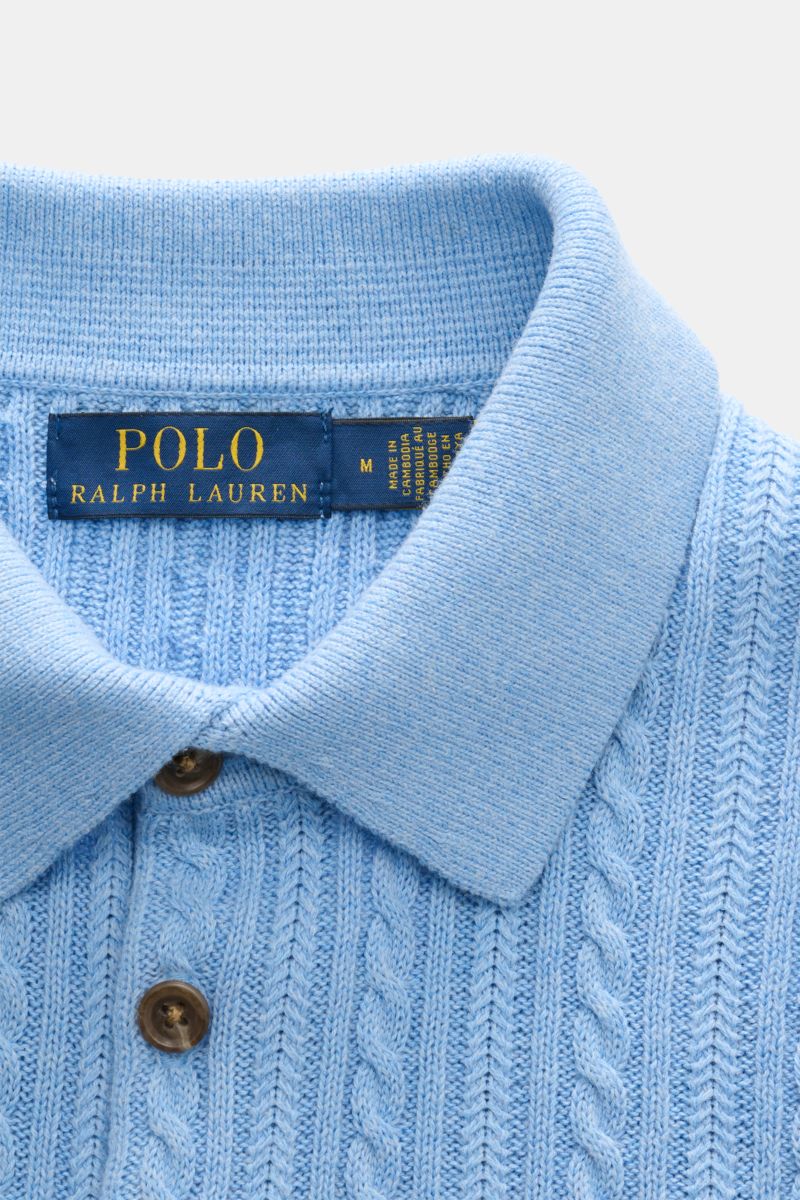Close-up front view of Polo Ralph Lauren Short sleeve knit polo light blue showing collar, buttons, and fine cable knit pattern.

Versatile classic: This short-sleeved knit polo by POLO RALPH LAUREN delivers maximum comfort and catches the eye on hot d