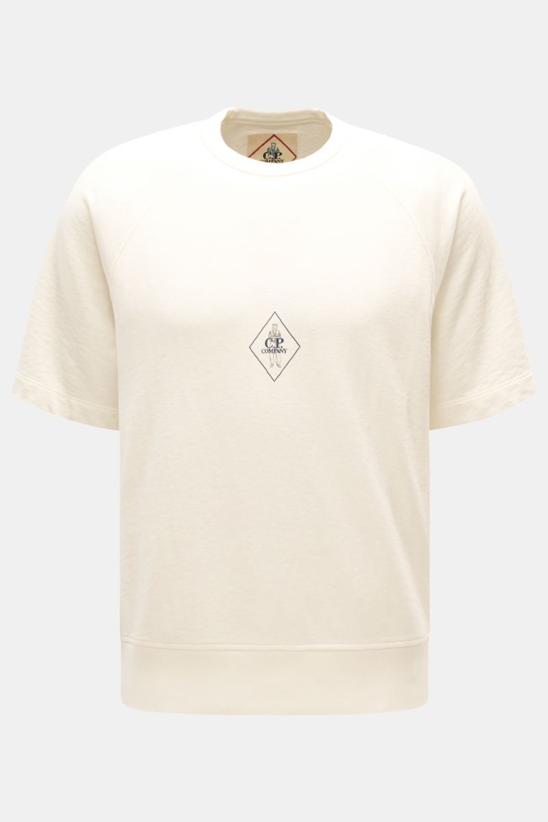 Alt tag (125 characters max):
Front view of C.P. Company Crew neck short sleeve sweatshirt cream with small retro logo print on chest, raglan sleeves.

Description:
This lightweight short sleeve sweatshirt with small logo print on the front is a cool s