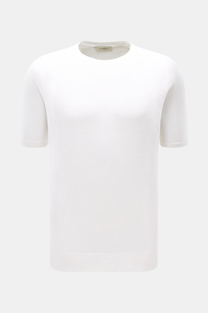 Front view of Piacenza 1733 Short sleeve jumper white, fine linen and cotton knit, slim fit, crew neck, raglan sleeves, light and airy.

Description: Tradition, innovation and uncompromising quality: For centuries, PIACENZA 1733 has been synonymous wit