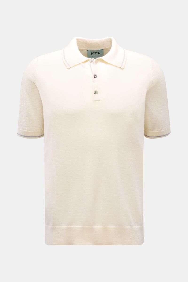 FTC Short sleeve knit polo cream shown from front, fine knit fabric in cashmere and Lyocell, slim fit, classic polo collar, three-button placket, soft lightweight feel with narrow contrasting borders and ribbed bands; sustainable from fibres to finished m