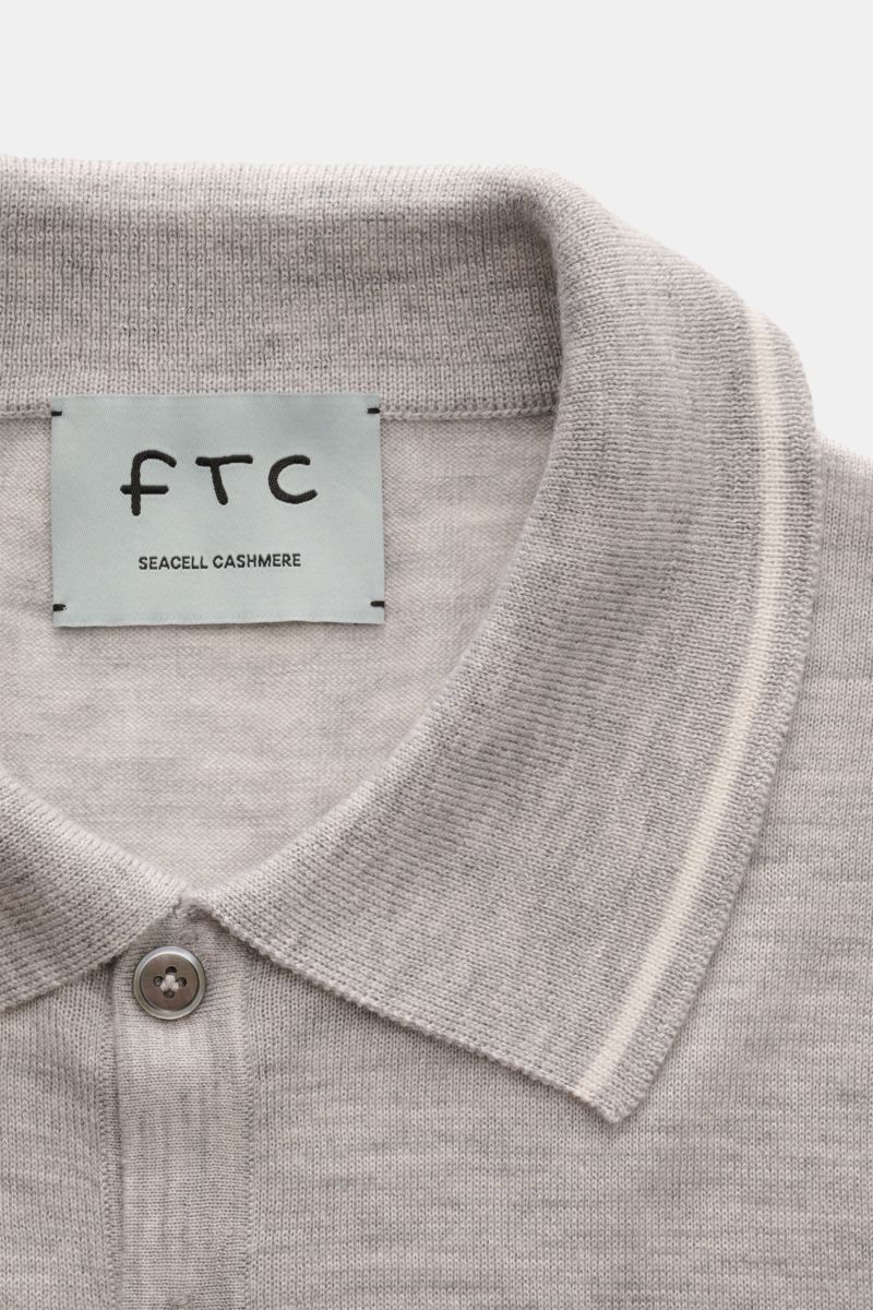 Close-up front view of FTC Short sleeve knit polo grey mottled collar and placket, fine cashmere-SeaCell knit, slim fit, soft, lightweight.