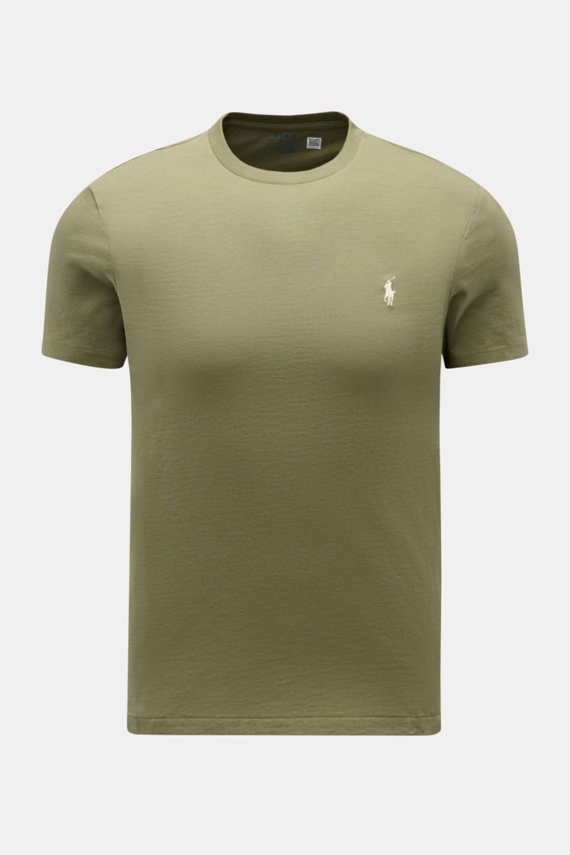 Front view of a Polo Ralph Lauren Crew neck T-shirt olive in extra slim fit with signature logo stitching on soft pure cotton fabric.

A sporty classic: This soft T-shirt in pure cotton by POLO RALPH LAUREN combines the iconic logo stitching with a sli