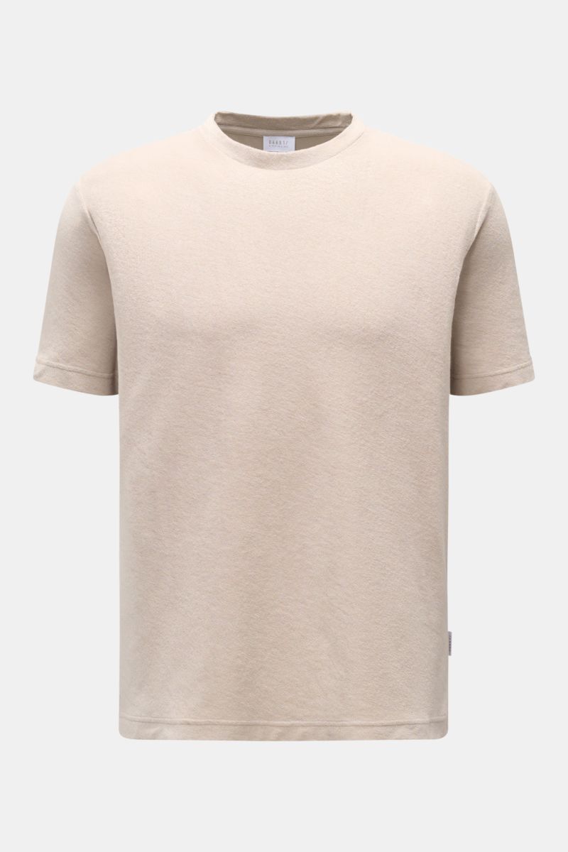 Front view of the 04651/ A trip in a bag Terry T-shirt 'Terry Tee' beige, made of soft pure cotton terrycloth, crew neck, regular fit with a small woven label in the side seam.

The clean T-shirt 'Terry Tee' by 04651/ A TRIP IN A BAG is made of soft te