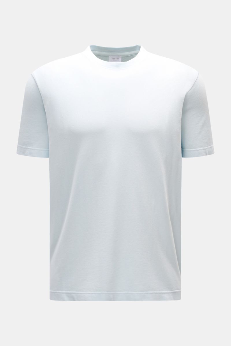 Front view of the 04651/ A trip in a bag Piqué T-shirt pastel blue, made of pure piqué cotton with a slim fit, crew neck, ribbed bands, and woven label in the side seam, offering a robust feel perfect for warm days.
