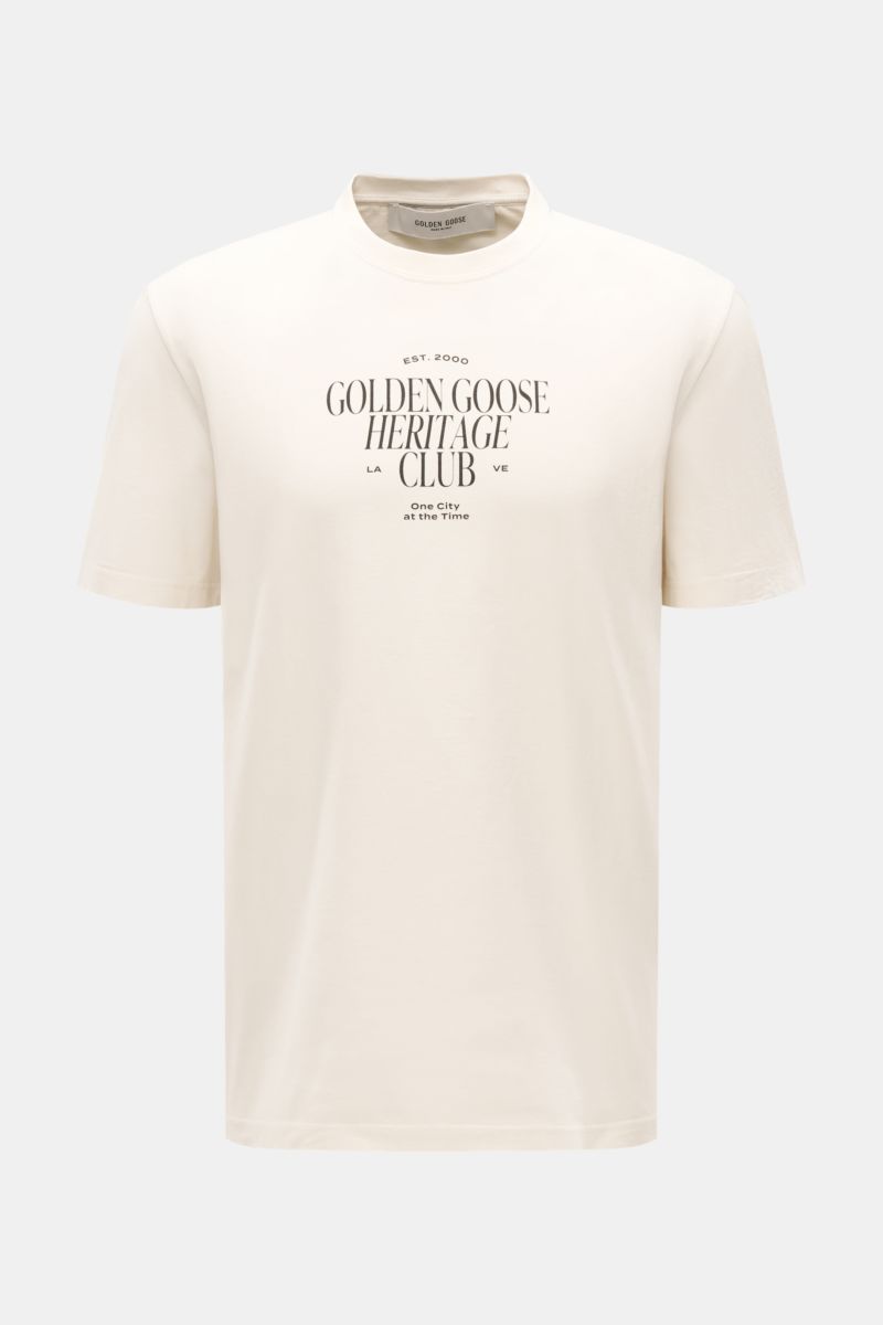Alt tag (125 characters max): Front view of Golden Goose Rundhals-T-Shirt creme with logo print, round neckline, regular fit, and cream cotton fabric.

Additional description:  
Urbaner Eyecatcher: Das T-Shirt von GOLDEN GOOSE ergänzt Sommerlooks mit m