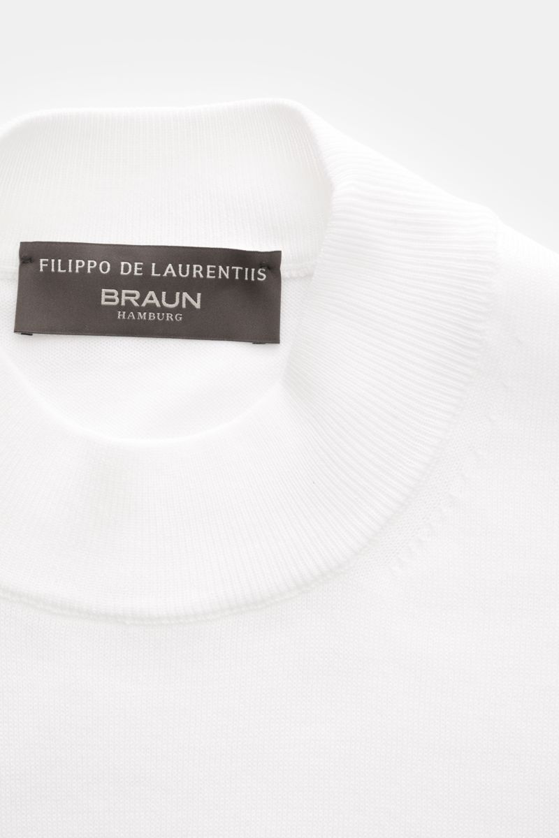 Filippo de Laurentiis Short sleeve jumper white shown from a top close-up perspective, featuring a standing collar and brand label. A versatile basic: This short sleeve jumper by FILIPPO DE LAURENTIIS features a timeless design and incomparable comfort