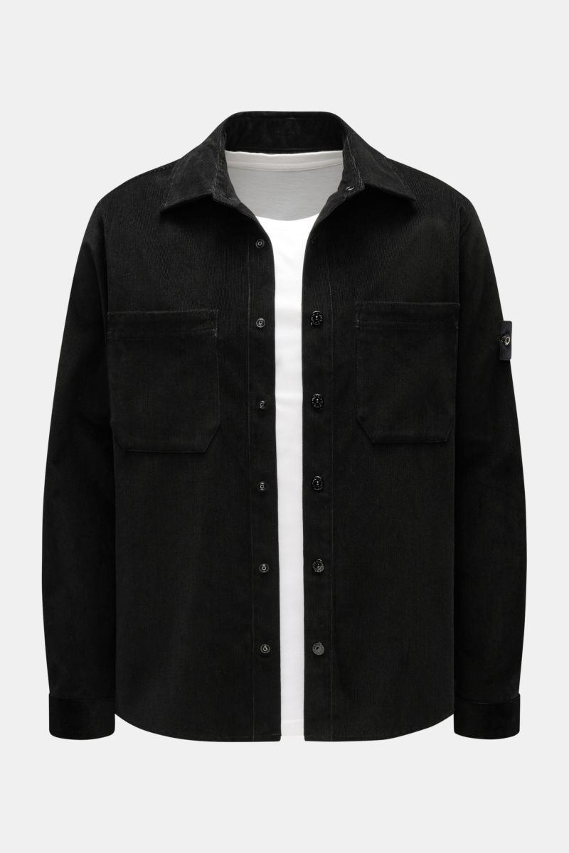 Front view of Stone Island Corduroy overshirt black in pure cotton corduroy with snap buttons, patch pockets, and signature compass badge on sleeve.

Sporty and practical – this straight cut overshirt by STONE ISLAND is characterised by iconic style an