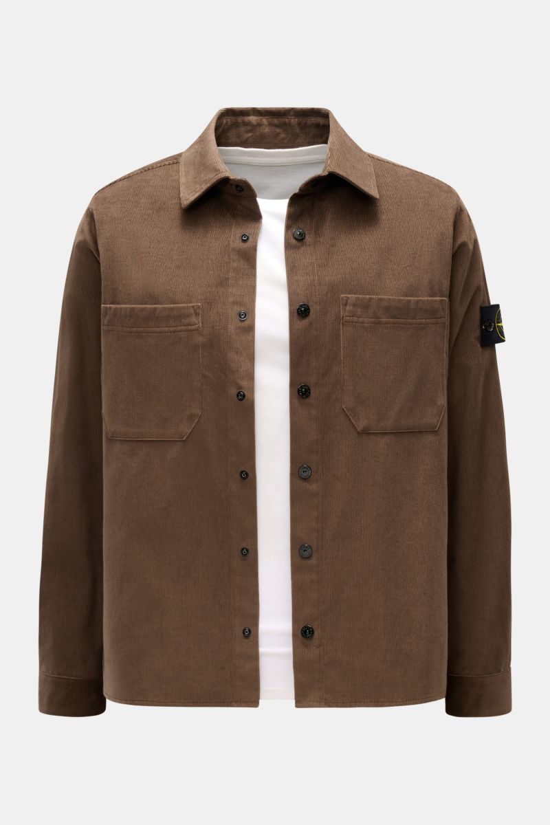 Front view of Stone Island Corduroy overshirt brown, featuring snap button placket, turn-down collar, patch breast pockets, and signature compass badge on sleeve.

Description: 
Sporty and practical – this straight cut overshirt by STONE ISLAND is char