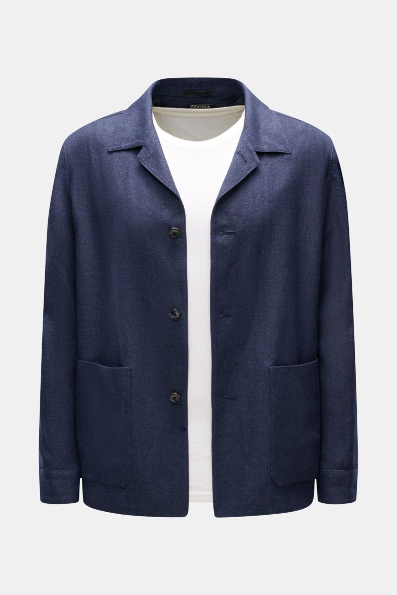 Front view of the Zegna Overshirt navy in fine twill linen and wool blend, featuring a lapel collar, three-button placket, patch hip pockets, and slim fit.

This overshirt by ZEGNA, made from linen and wool, embodies Italian casual style with its pleas