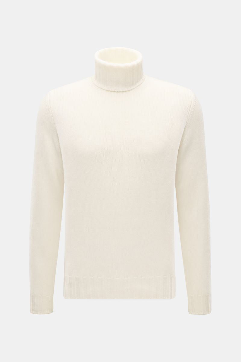 Front view of Fioroni Cashmere Rundhalspullover creme, a luxurious cream-colored turtleneck sweater made from pure cashmere with a very soft feel, medium-fine knit, slim fit, and flexible ribbed cuffs. Souveräne Eleganz in ihrer luxuriösesten Form: Der Ro