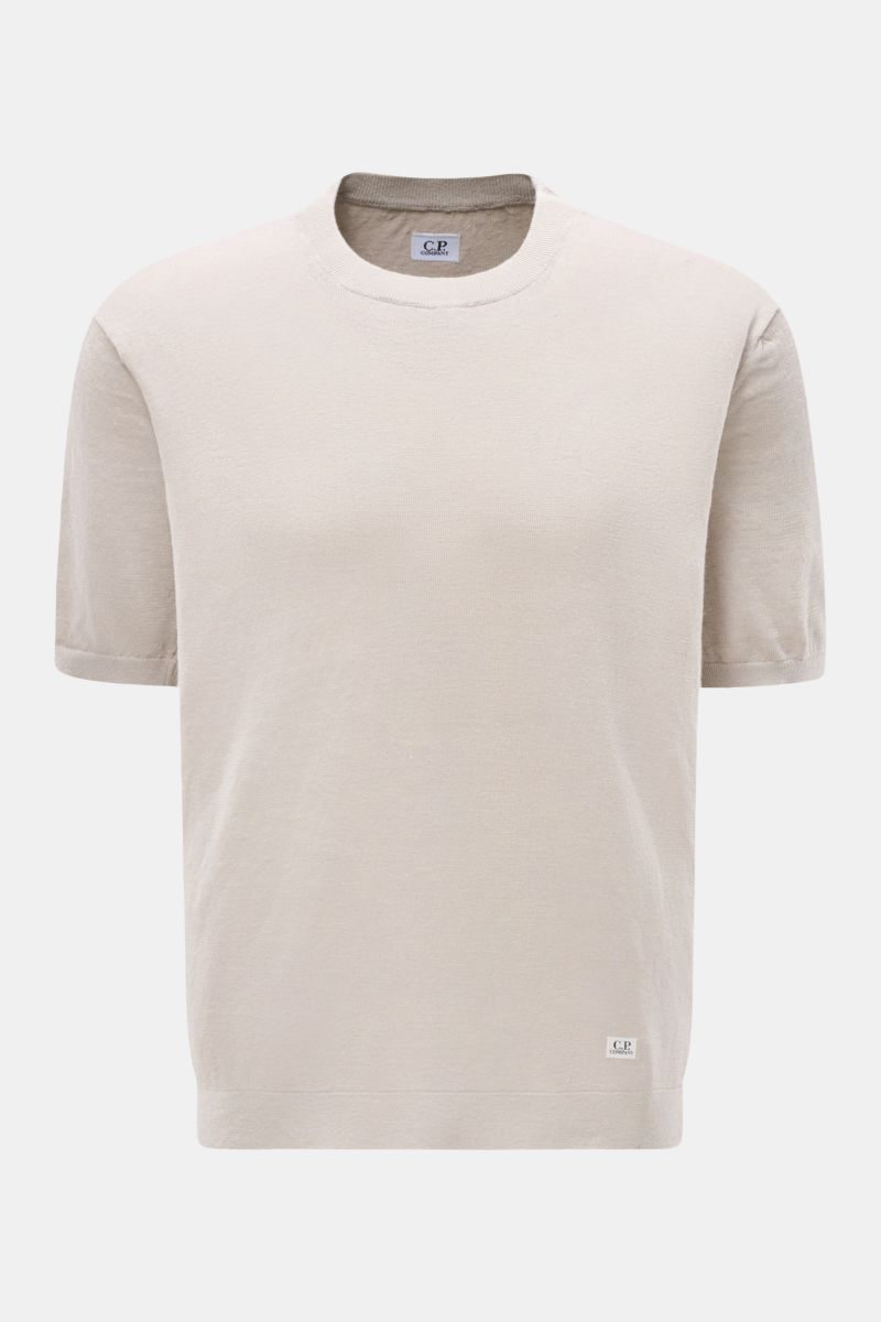 C.P. Company Kurzarmpullover grau, leichter Leinenstrick, Regular Fit, elastische Rippbündchen, kleines Weblabel, frontal fotografiert, feines Strickbild.