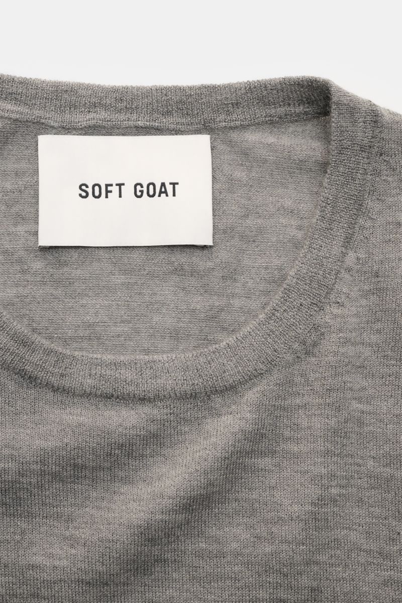Soft Goat Cashmere crew neck jumper grey mottled shown from a close-up top front view, featuring fine knit, wide ribbed bands, and crew neck collar. Sustainably produced and certified: Young label SOFT GOAT shows how it’s done with its super lightweigh