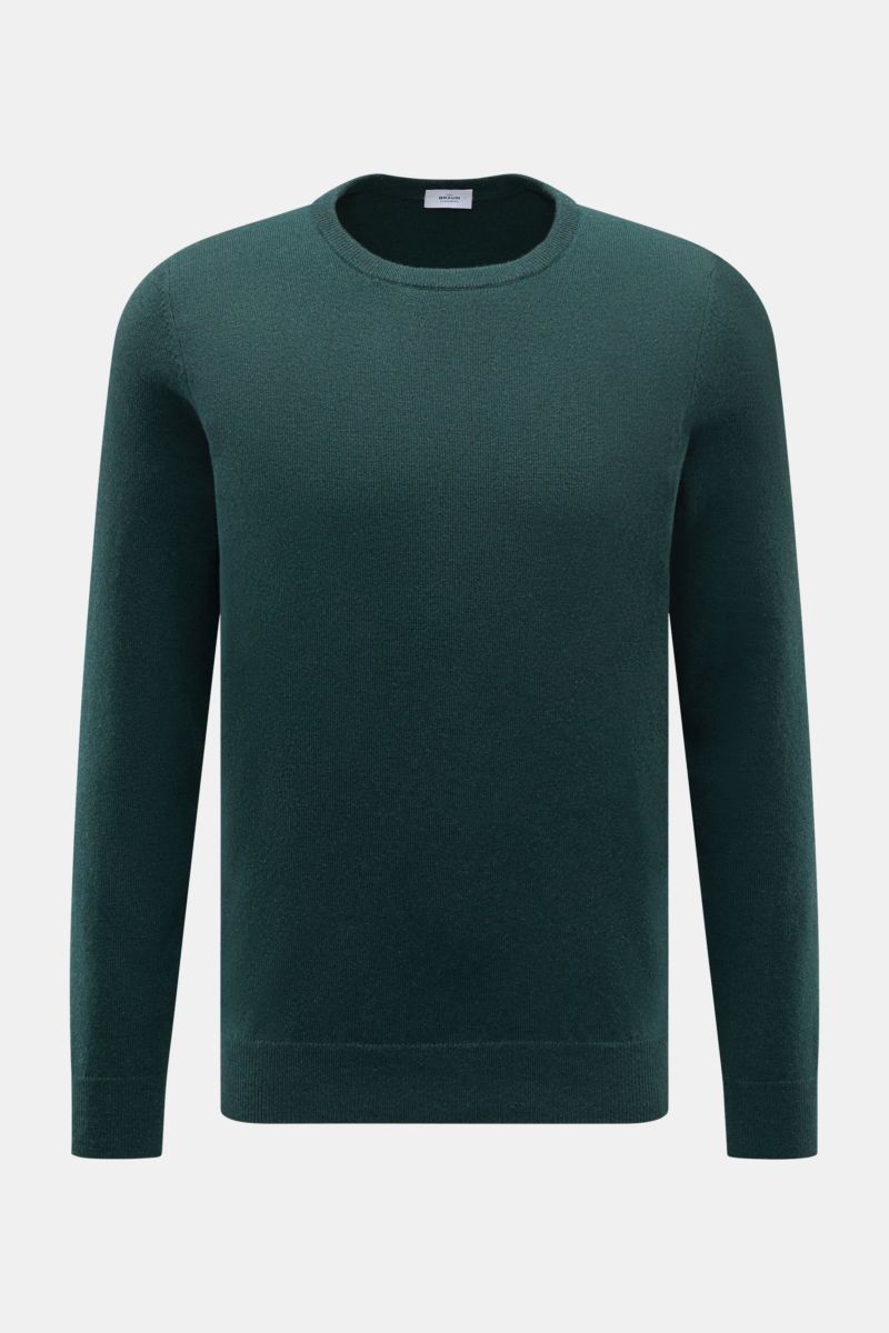 Front view of von Braun Cashmere crew neck jumper dark green, a slim fit fine knit pure cashmere jumper with soft feel, crew neck, and flexible ribbed bands. A versatile essential for colder months adding timeless elegance to winter outfits.