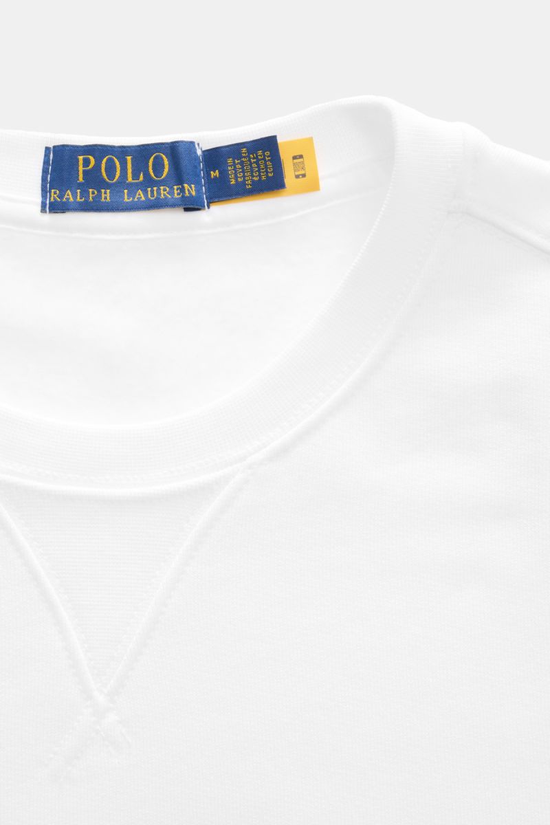 Alt tag (125 characters):
Close-up front view of Polo Ralph Lauren Sweatshirt white crew neck with brand label, soft fabric, and ribbed bands.

Description:
The Polo Bear by POLO RALPH LAUREN is back and makes a fashion statement with a bike in casual 