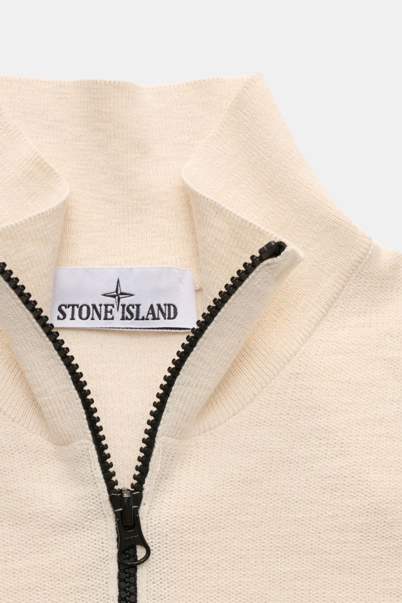 Close-up front view of Stone Island Half-zip jumper cream showcasing the black zipper and textured cream purl stitch knit.

Description: 
Knit with a twist: The sporty half-zip jumper by STONE ISLAND in a modern purl stitch is an ideal leisure companio