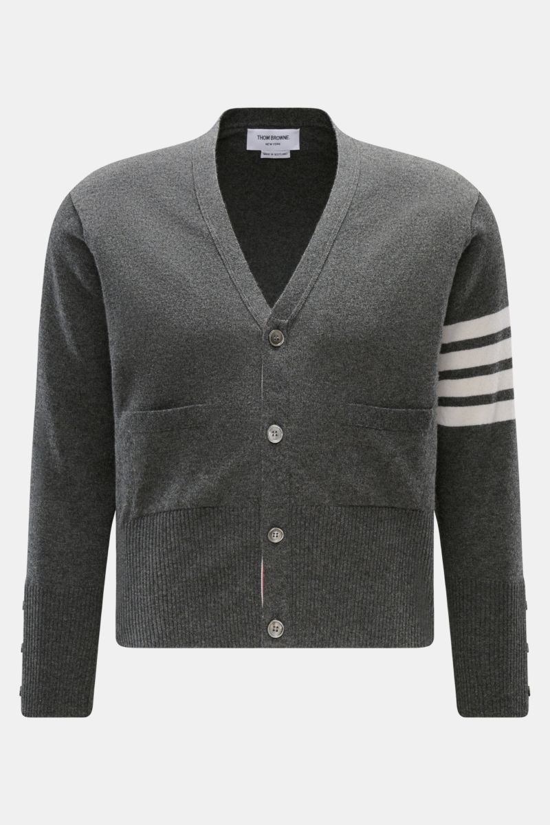 Front view of Thom Browne Cashmere Cardigan dunkelgrau meliert in dark gray melange, featuring pure cashmere, soft touch, fine knit, regular fit, button placket, patch pockets, wide rib cuffs, and buttoned side slits.