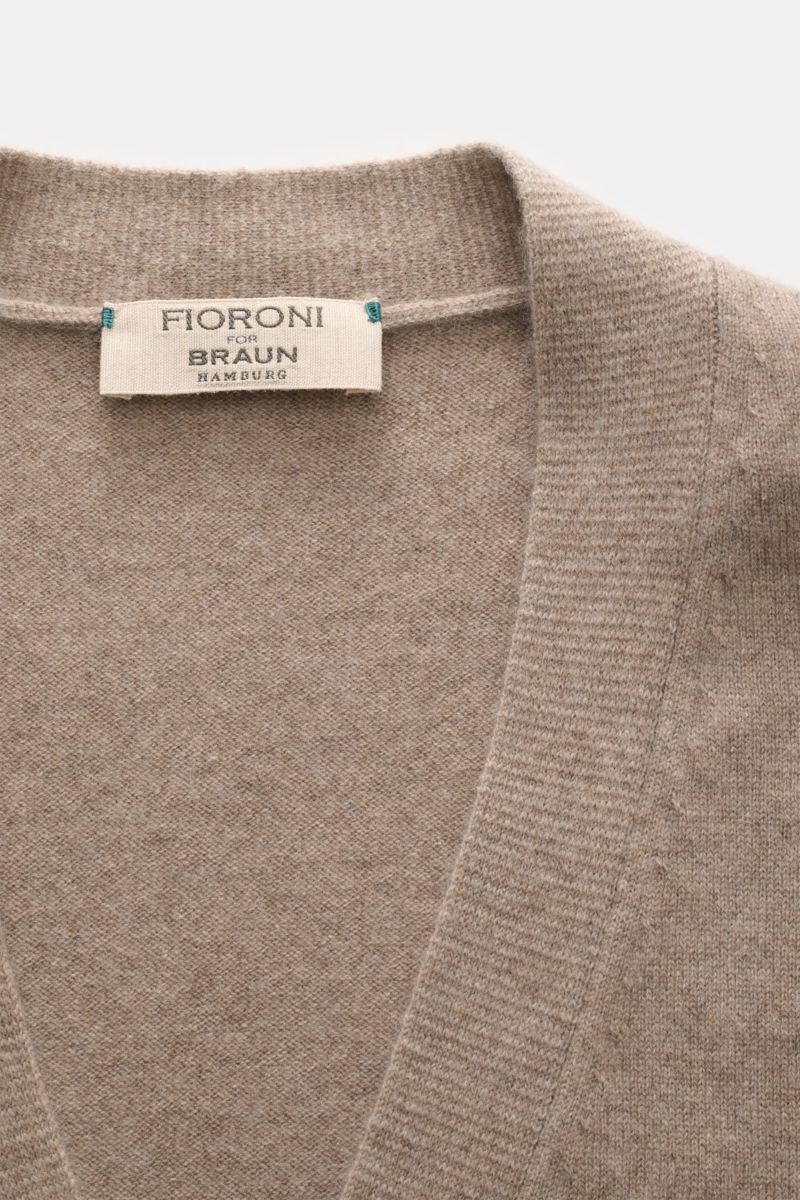 Close-up front view of Fioroni Cashmere cardigan taupe mottled showing fine knit, smooth button placket, flexible ribbed bands, and soft baby cashmere fabric. Exquisite craftsmanship from Italy: This cardigan by FIORONI is precisely made from fine materia