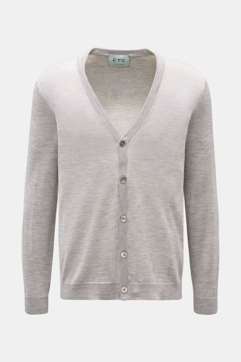 Front view of the FTC Cardigan grey melange, a slim fit, very fine knit V-neck cardigan with five-button placket and ribbed bands.

This luxurious cardigan by eco-friendly knitwear label FTC is a soft knitwear essential made of fair trade cashmere in a