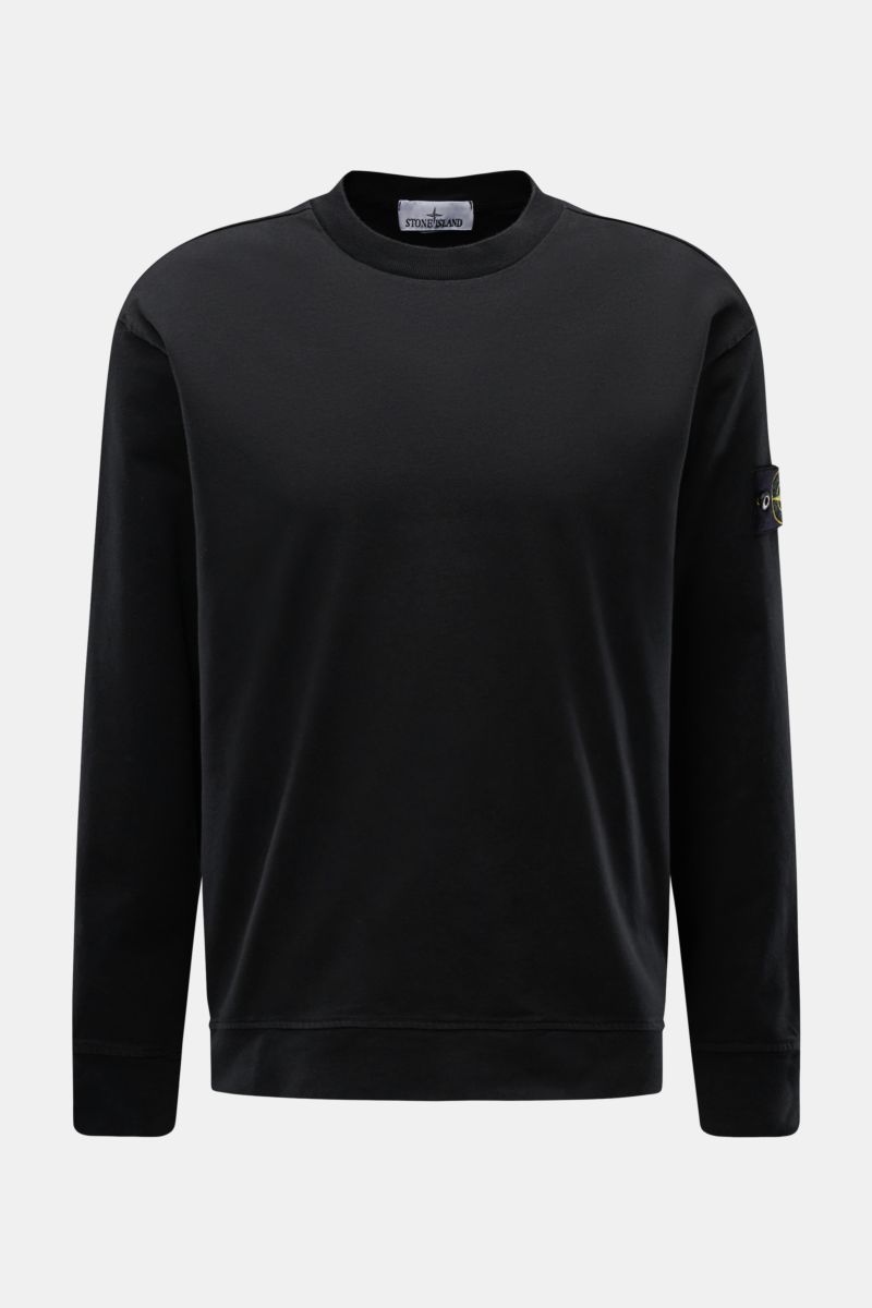Front view of Stone Island Long sleeve black crew neck sweatshirt in heavy cotton jersey with compass badge on the sleeve.

Description: 
With this crew neck long sleeve in heavy cotton jersey with compass badge on the sleeve, STONE ISLAND brings us a 