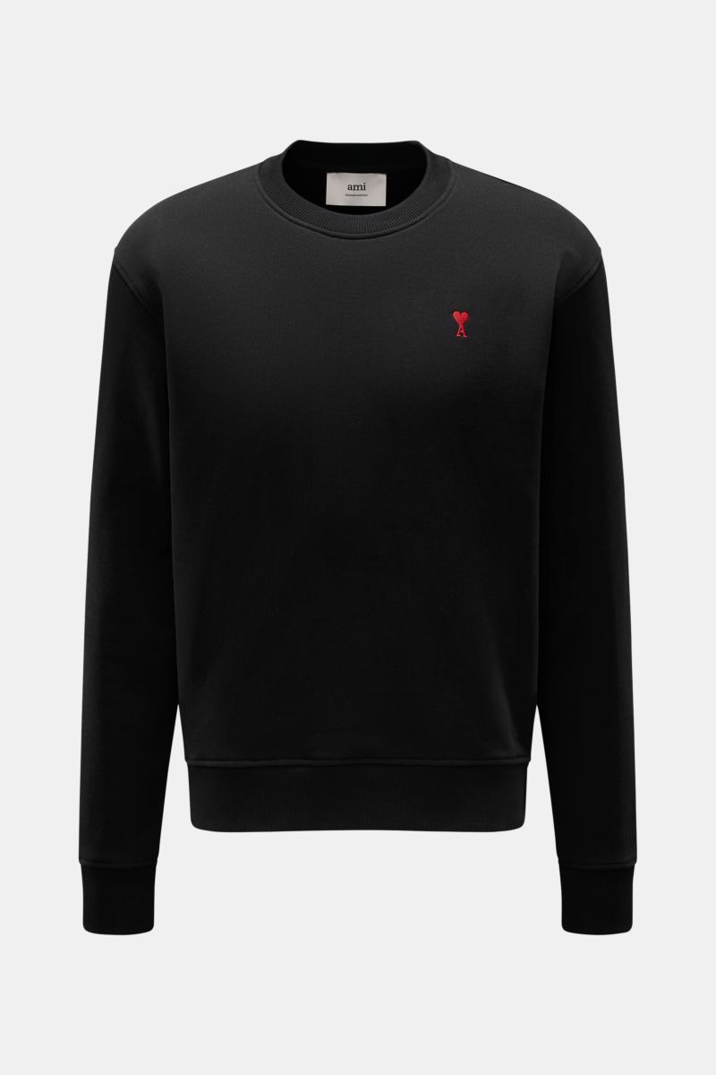A front view of the Ami Paris Rundhals-Sweatshirt schwarz, a black crewneck sweatshirt made of pure cotton with a soft feel, regular fit, logo stitching on the chest, and flexible ribbed cuffs. Komfortables Basic: Das AMI PARIS Sweatshirt aus reiner Ba