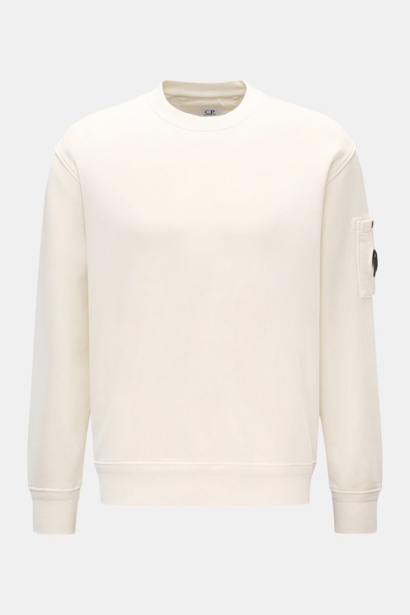 C.P. Company Sweatshirt off-white shown from the front, lightweight pure cotton crew neck with soft feel, regular fit, ribbed cuffs, and upper sleeve pocket featuring signature lens detail 