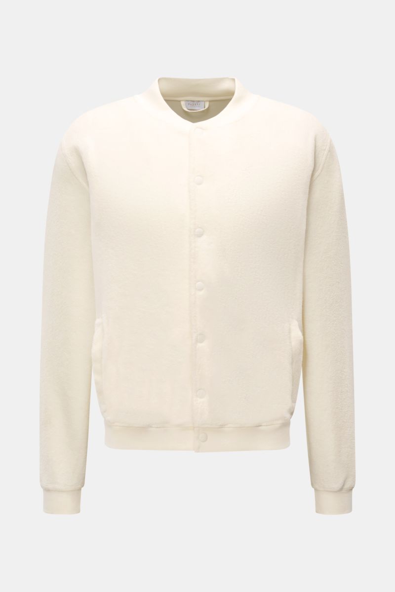 Front view of 04651/ A trip in a bag Fleece blouson off-white made of pure cotton fleece, soft feel, slim fit, snap button placket, signature blouson collar in rib knit, angled hip pockets, comfortable ribbed bands, and woven label in the side seam.