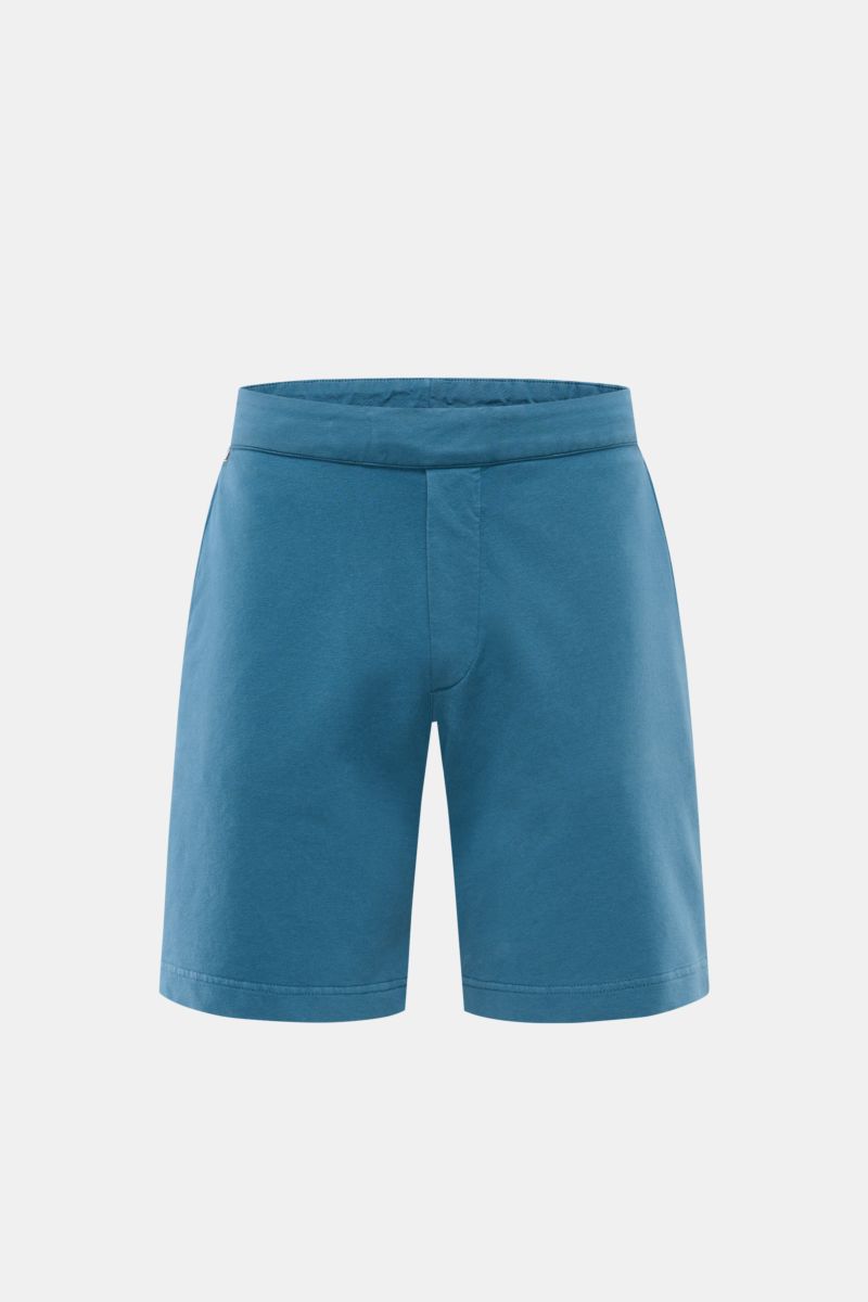 Front view of 04651/ A trip in a bag Sweat shorts teal made from soft stretch cotton, featuring elastic waistband, faux fly, and French pockets.

Relaxation all day long: These sweat shorts by 04651/ A TRIP IN A BAG, made from stretch cotton, are soft 