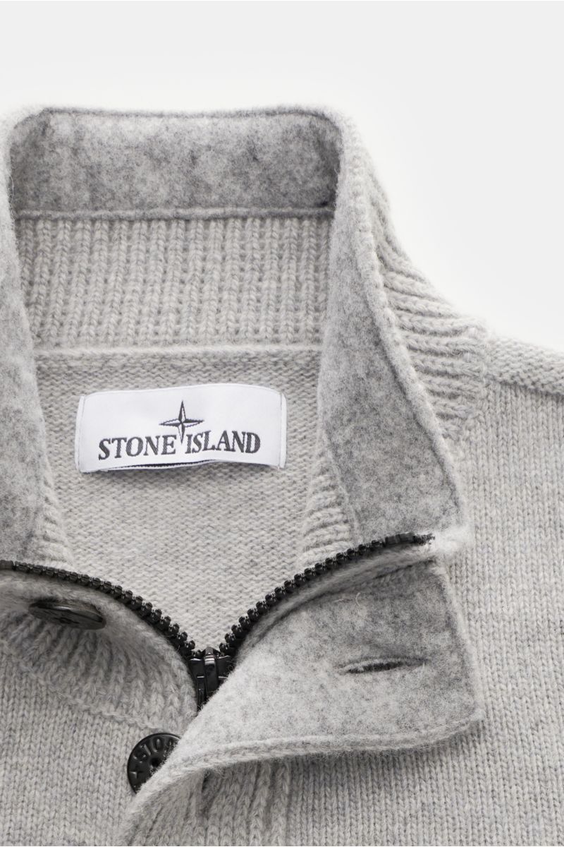 Close-up front view of Stone Island Half-zip jumper 'Lambswool' light grey showing half-zip collar with zip, embossed buttons, and soft wool blend knitwear.

A stylish essential for the colder months: This timeless half-zip jumper by STONE ISLAND with 
