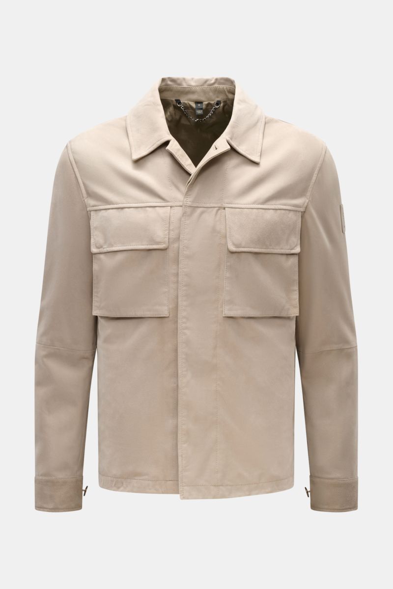 Front view of Belstaff Suede jacket 'Waymark' sand in supple suede with concealed button placket, patch breast pockets, and turn-down collar.

Description: 
A versatile piece in supple suede: The hybrid 'Waymark' by BELSTAFF is a cool alternative piece