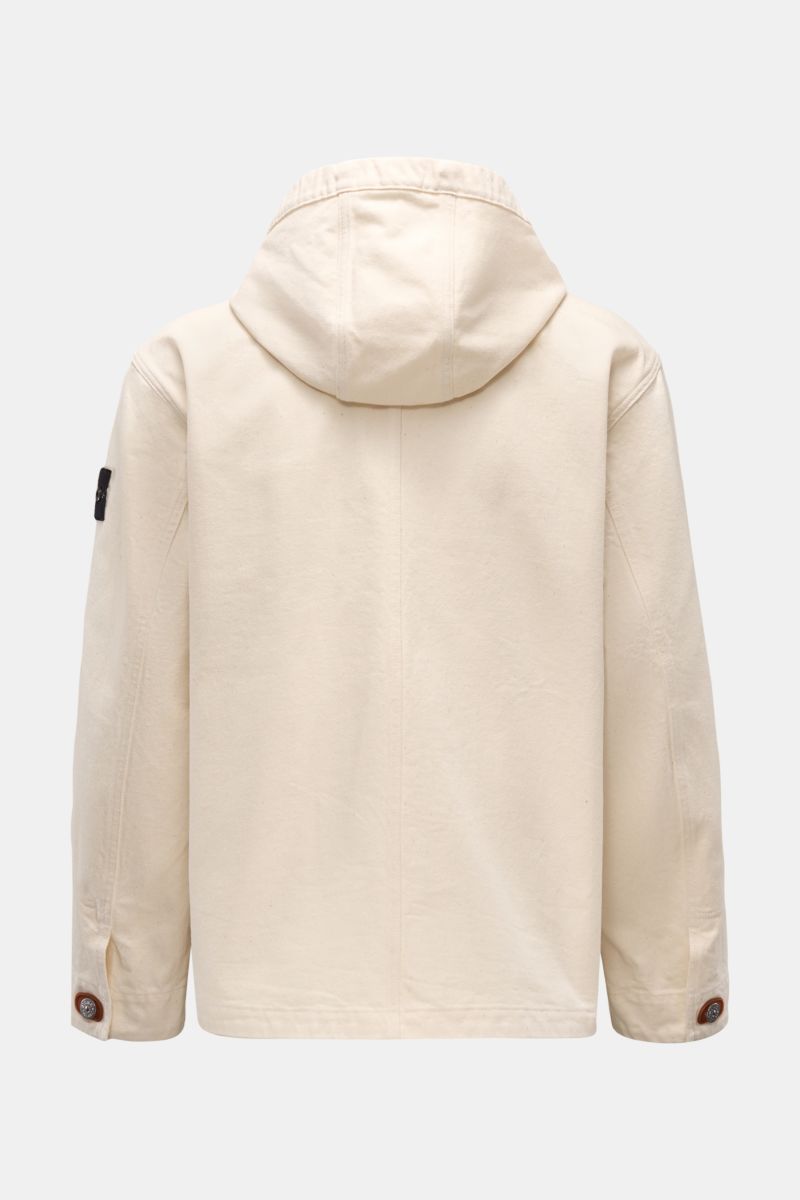 Rear view of Stone Island Popover-Jacke 'Raw Beauty' creme with gabardine cotton, removable hood, button cuffs, and compass badge on sleeve.