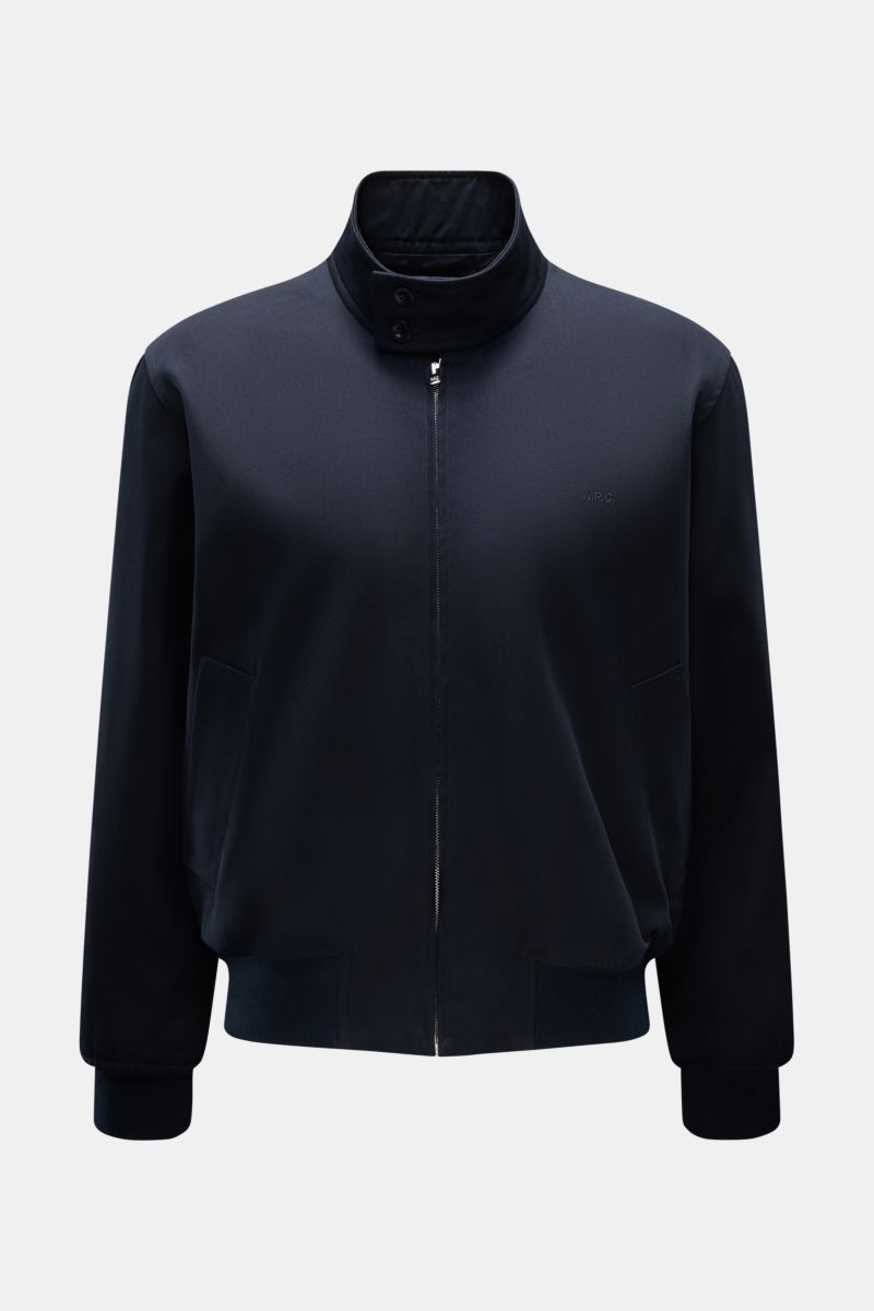 Front view of A.P.C. Blouson dark navy made of pure cotton gabardine with buttoned standing collar, concealed zip, tonal logo stitching, elastic hem and cuffs, slanted hip pockets, and one inside pocket. Distinctive, urban and clean: This blouson by A.P.C
