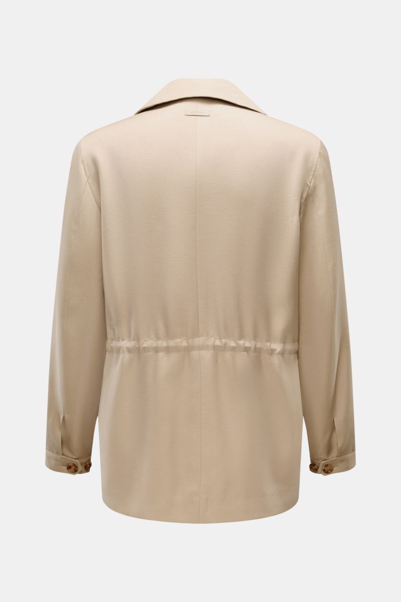 Rear view of the Lardini Jacket 'Panosh' beige, a slim fit, viscose-silk blend field jacket with adjustable waist and lapel.

Description incorporating content: The image shows the back of the Lardini Jacket 'Panosh' beige, photographed from a straight re