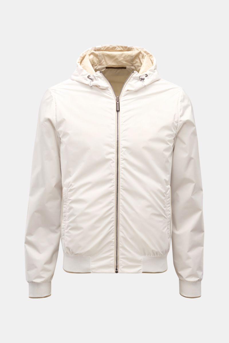 Moorer Wende-Blouson 'Dennys' offwhite/beige, frontal fotografiert, wasserabweisender Slim Fit mit Kapuze, Zipper-Taschen, elastischem Saum.