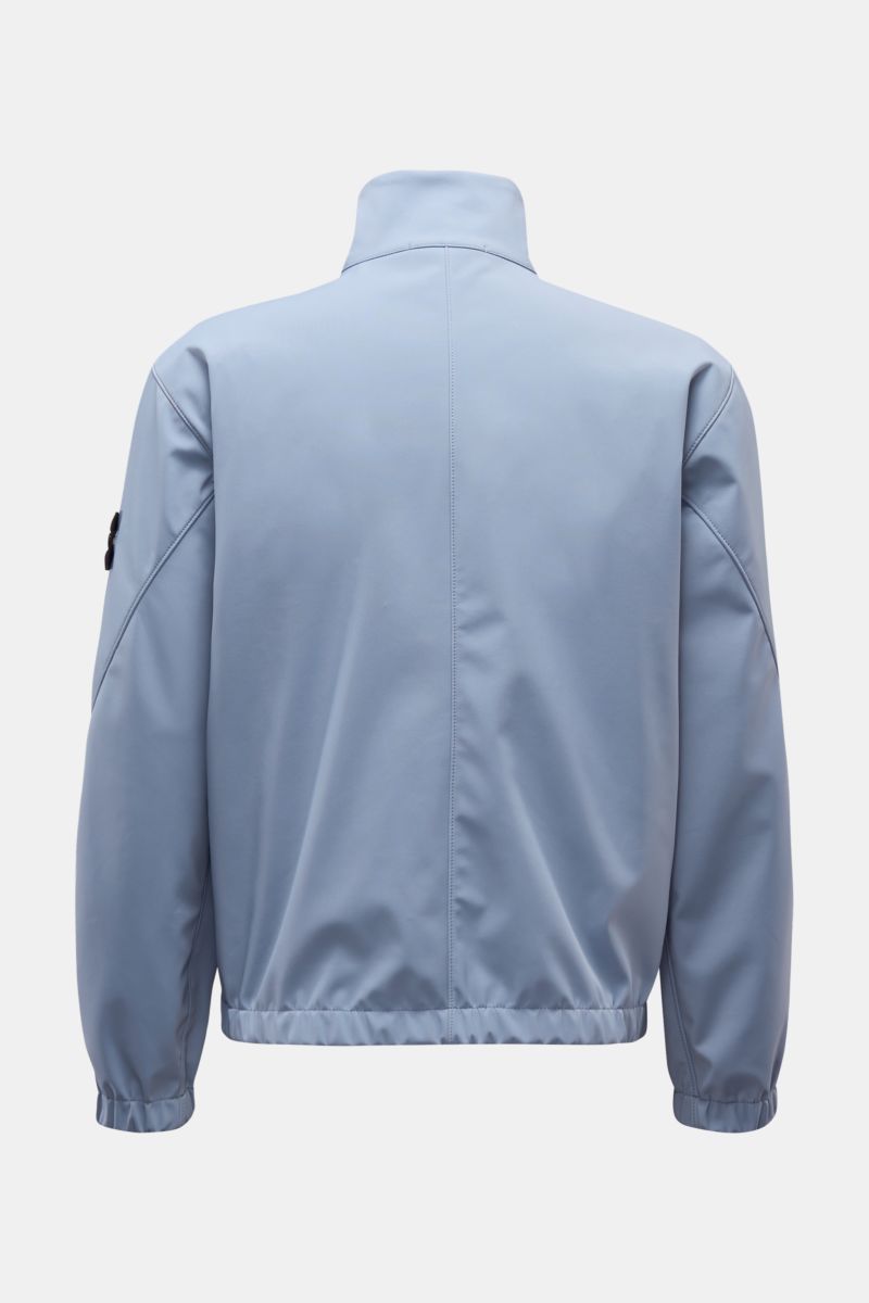Rear view of Stone Island Jacke 'Light Soft Shell-R' rauchblau in slim fit, made of smooth, wind- and water-resistant microfiber with elastic cuffs and a stand-up collar.