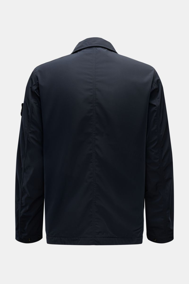 Back view of Stone Island Jacke 'Micro Twill' navy jacket in smooth, water-repellent microfiber with slim fit, adjustable cuffs, and compass badge on sleeve.