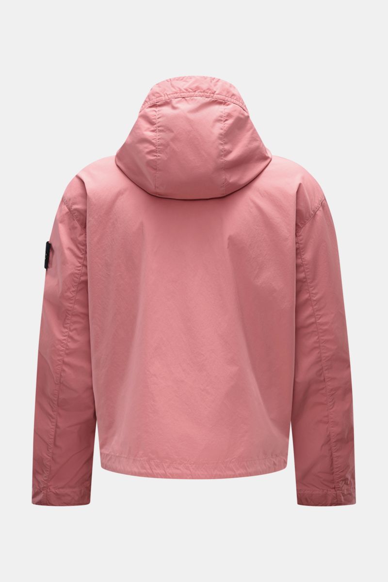 Stone Island Jacket 'Light Compact Touch Poly-TC' antique pink shown from the back, lightweight, water repellent, stretchy microfiber with hood, patch pockets, adjustable cuffs, compass badge. Made for changeable days: The lightweight, water repellent jac
