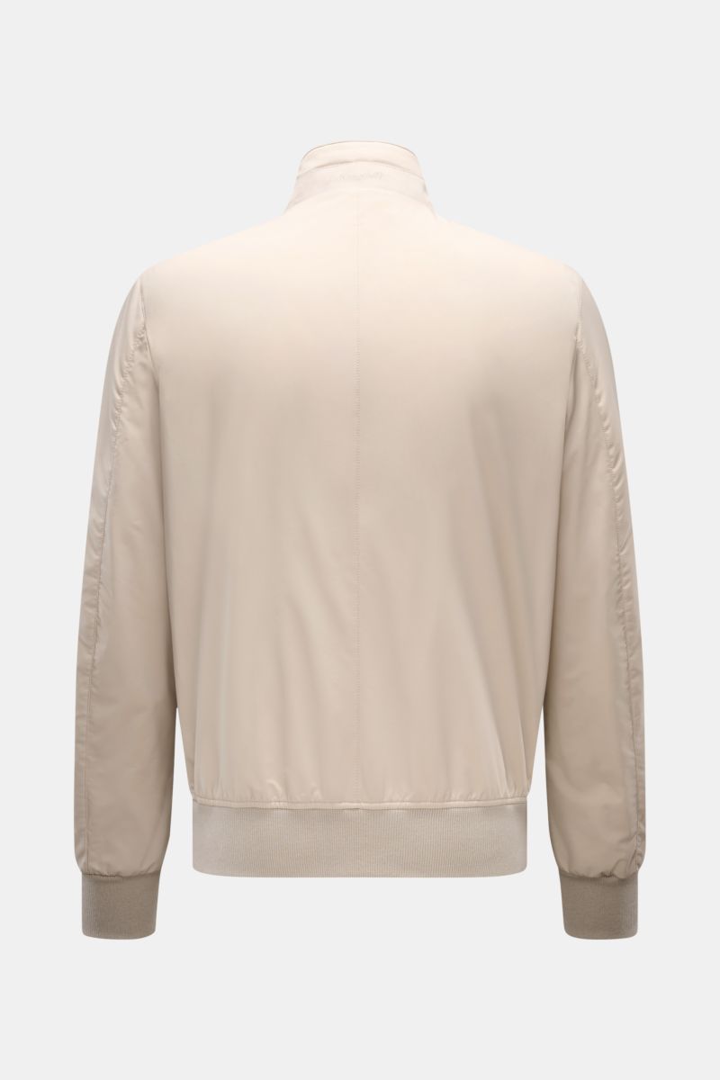 Mandelli Blouson beige shown from the back, slim fit with high-closing standing collar, wide ribbed bands, and soft microfibre material. A perfect symbiosis of luxury and comfort: This blouson by MANDELLI is confidently elegant and effortlessly enhances y