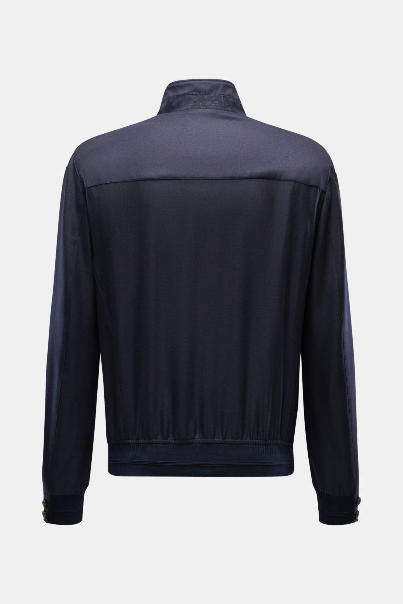 Rear view of Mandelli Cashmere blouson navy, pure cashmere, soft feel, slim fit with two-way zip, standing collar, elastic hem and cuffs, half lined, two inside pockets. Exquisite ease for the transitional period, timelessly elegant with a luxurious chara