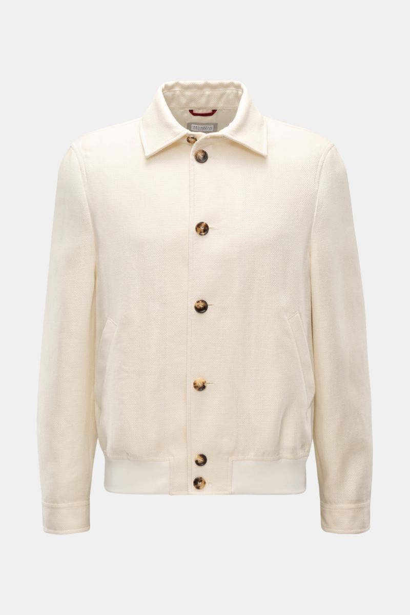 Brunello Cucinelli Blouson creme, slim fit, aus Seide, Leinen & Wolle, mit markanter Webstruktur, Knopfleiste, Umlegekragen, frontale Ansicht.
