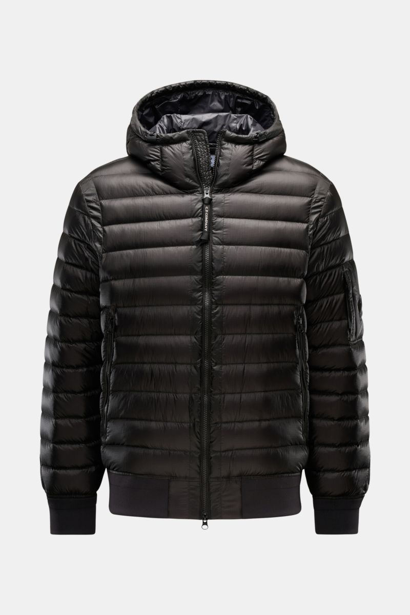 Front view of C.P. Company Down bomber jacket black with water repellent ripstop surface, lightweight down padding, slim fit, and drawstring hood. Technical lightness in its most modern form: This blouson by C.P. COMPANY has a water repellent ripstop surf