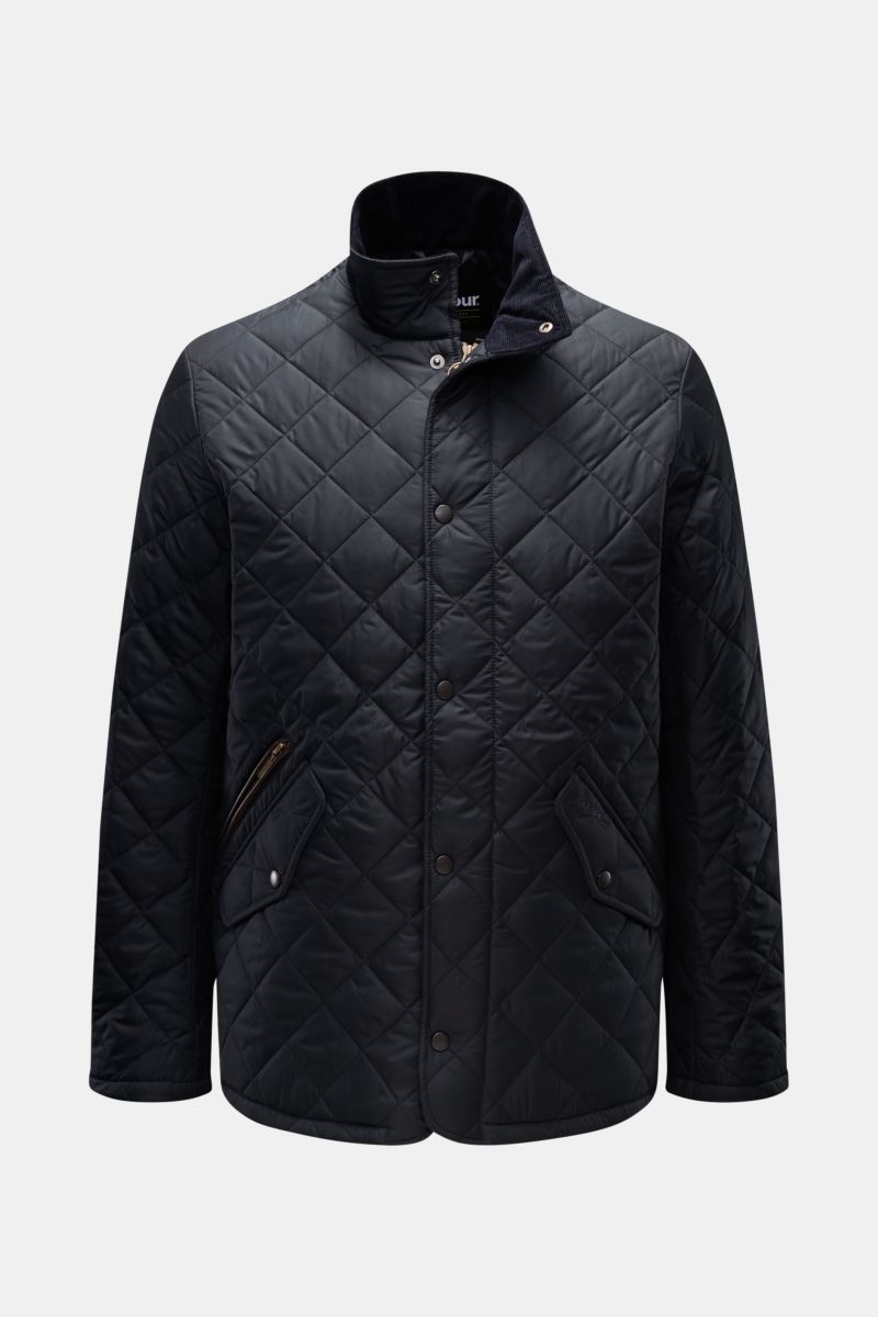 Front view of Barbour Quilted jacket 'Chelsea Sportsquilt' dark navy, featuring quilted microfibre, lightweight padding, two-way zip, corduroy-trimmed standing collar, angled zipped and snap button flap pockets, tonal stitching, side adjusters, and unline