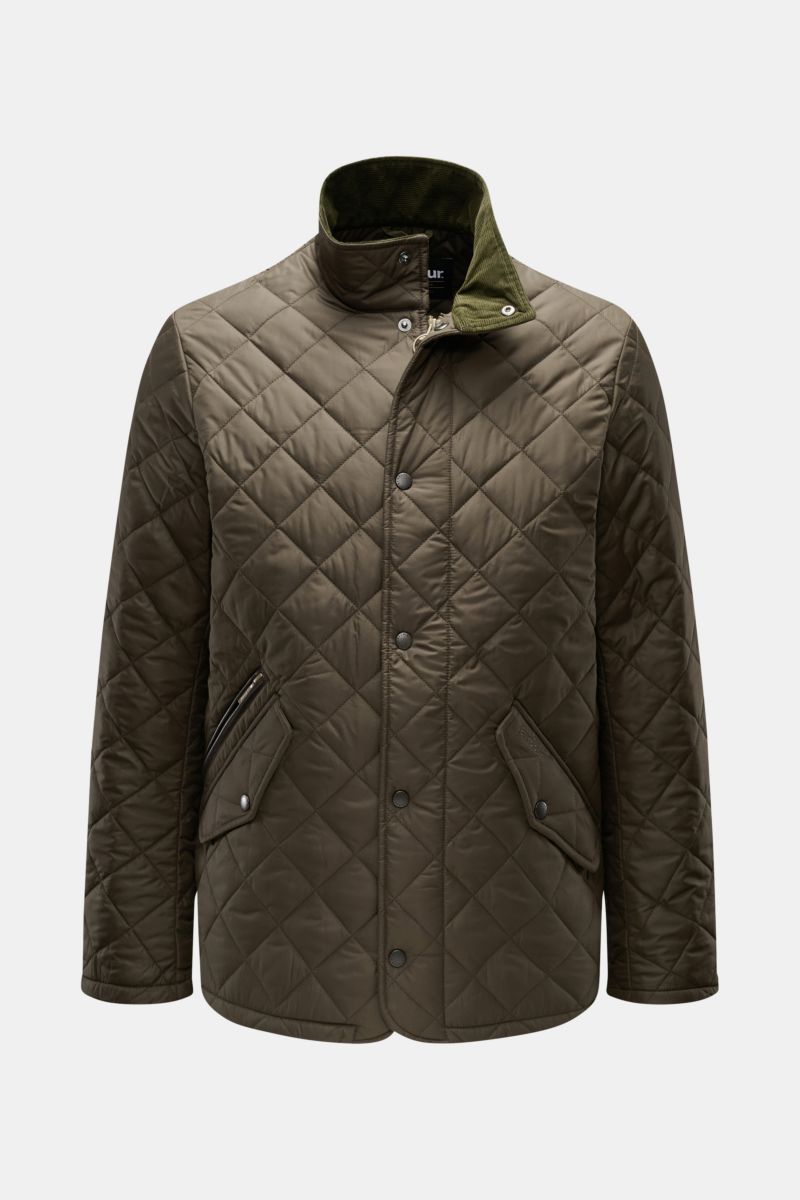 Front view of Barbour Quilted jacket 'Chelsea Sportsquilt' olive, unlined with lightweight padding, quilted microfibre, two-way zip, storm flap, corduroy collar, angled zipped and flap pockets, tonal stitching, and side adjusters.

Description: Perfect fo