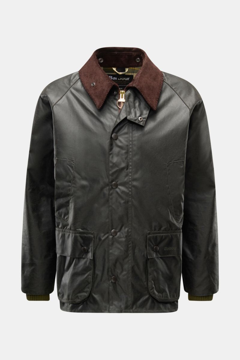 Front view of Barbour Waxed jacket 'Bedale' dark green with brown corduroy collar, snap buttons, and patch pockets.

Description: Perfectly equipped for the changing seasons: The 'Bedale' from BARBOUR is made from waxed cotton and features the signatur
