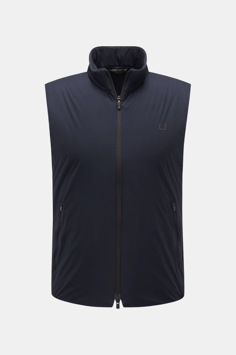 Front view of UBR Outdoor-Weste 'Raptor' navy, a slim-fit vest with soft microfiber, light padding, stand-up collar, two-way zipper, angled zipper pockets, reflective logo print, back reflector, tonal lining, and one inner pocket. Leichtigkeit, die man sp