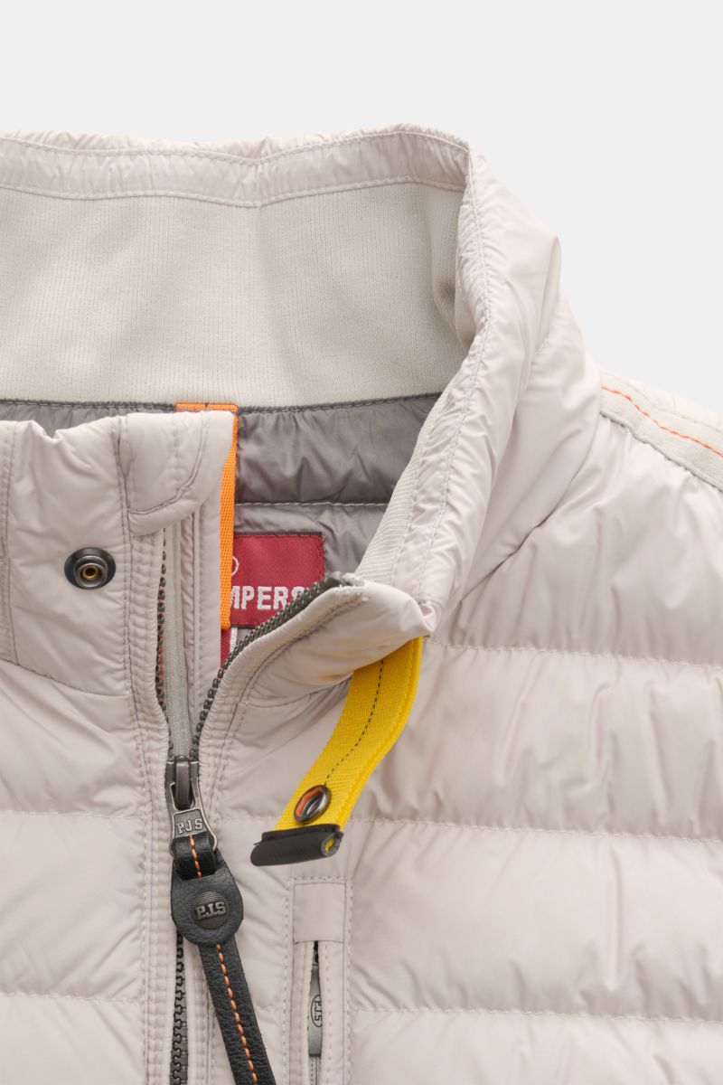 Close-up front view of Parajumpers Down gilet 'Perfect' sand showing high-closing collar, two-way zip with leather pull, yellow collar tab, and quilted microfiber fabric.

Description: The incredibly lightweight and comfortable down gilet 'Perfect' by 