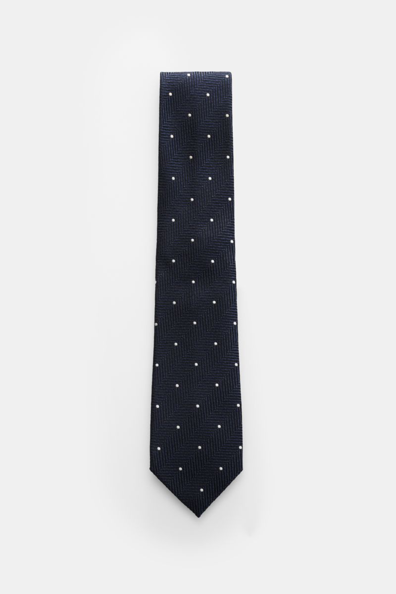 Tom Ford Seidenkrawatte navy/schwarz/creme gemustert, frontale Draufsicht, reine Seide, dezenter Glanz, Fischgratmuster mit Punkten, 8 cm breit, made in Italy.