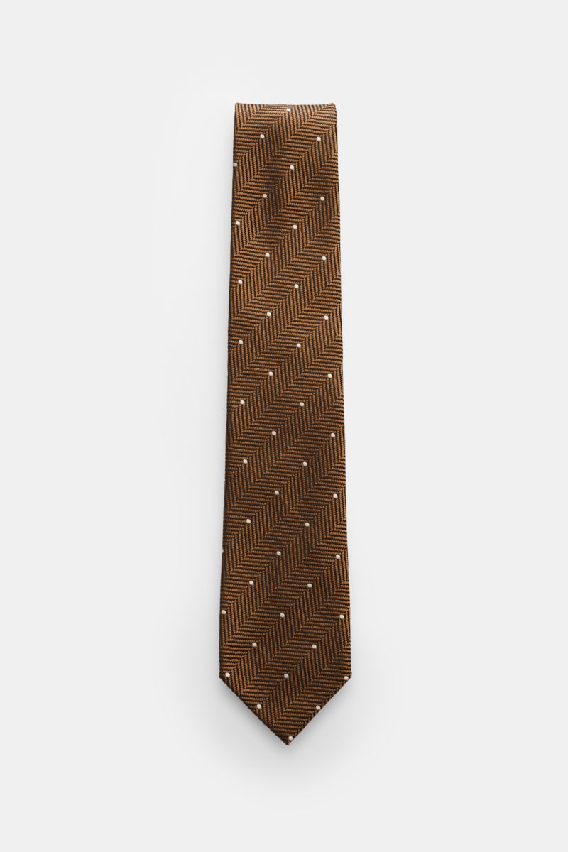 Tom Ford Seidenkrawatte hellbraun/schwarz/creme gemustert, frontale Draufsicht, feine Seide, Fischgratmuster, dezenter Glanz, 8 cm breit, made in Italy.