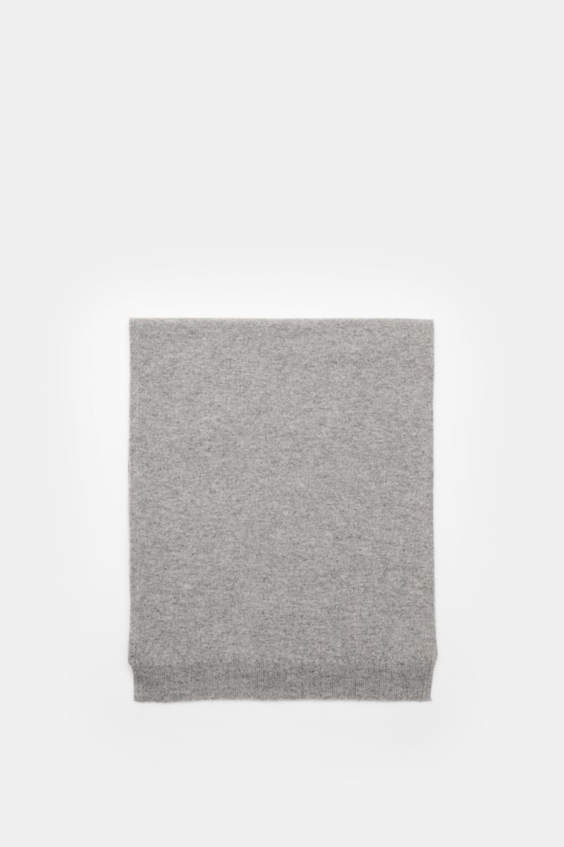 Top-down view of the 04651/ A trip in a bag Cashmere Schal creme, a luxurious pure cashmere scarf with soft feel, ribbed edges, measuring approx. 162 cm x 34 cm, from the 'Look of the Games' Capsule inspired by the 2026 Olympics, offering elegant warmth f