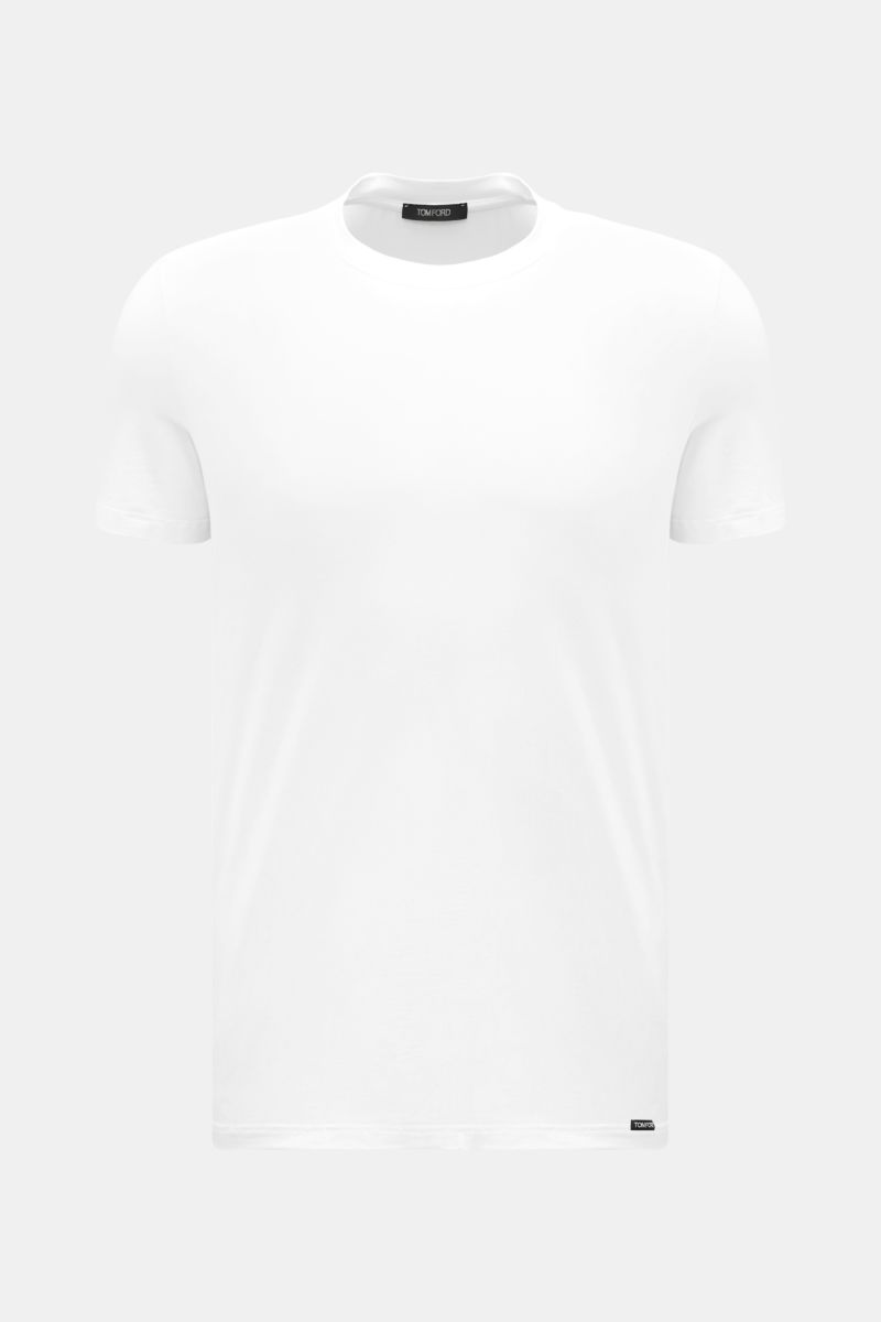 Front view of Tom Ford Rundhals-Unterhemd weiß, a clean basic white T-shirt with round neckline, extra slim fit, elastic cotton, soft touch, and a small TOM FORD label at the hem. 

Description: Cleanes Basic mit Rundhalsausschnitt: Das komfortable T-S