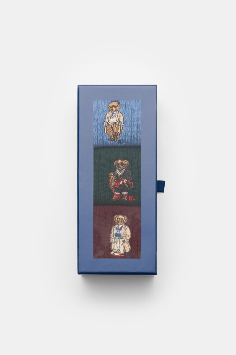 Polo Ralph Lauren Strümpfe 3er-Set rauchblau/dunkelgrün/bordeaux, von oben fotografiert, mit Rippstrick, breitem Bündchen und Teddy-Stitching.